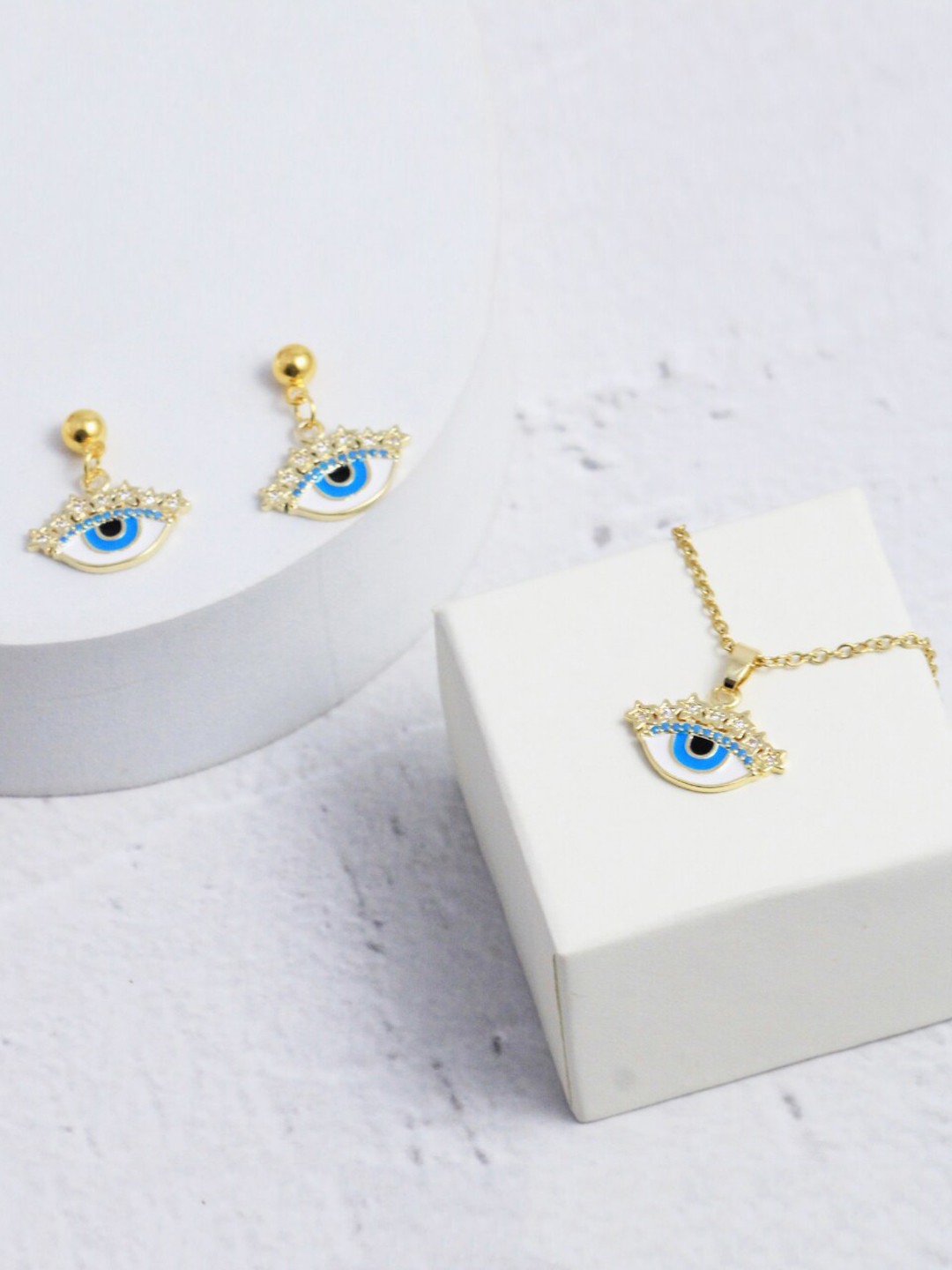 

DressBerry Gold-Plated Stone Studded Evil-Eye Pendant Jewellery Set