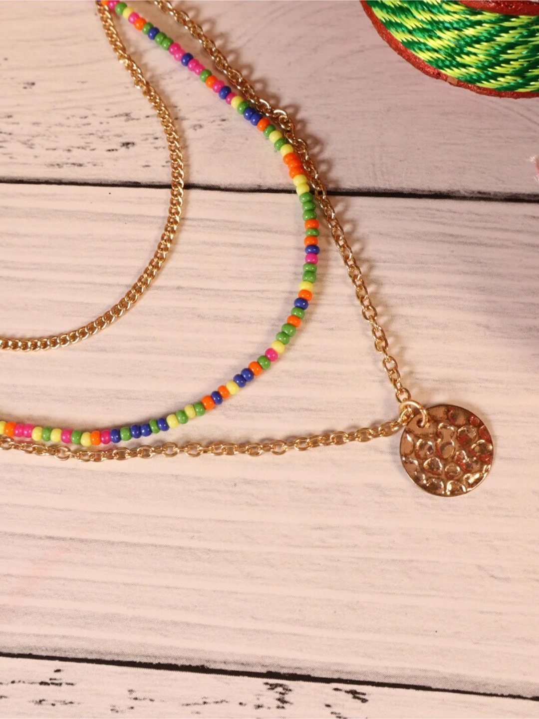 

DressBerry Gold-Toned Gold-Plated Artificial Beads Beaded Layered Necklace