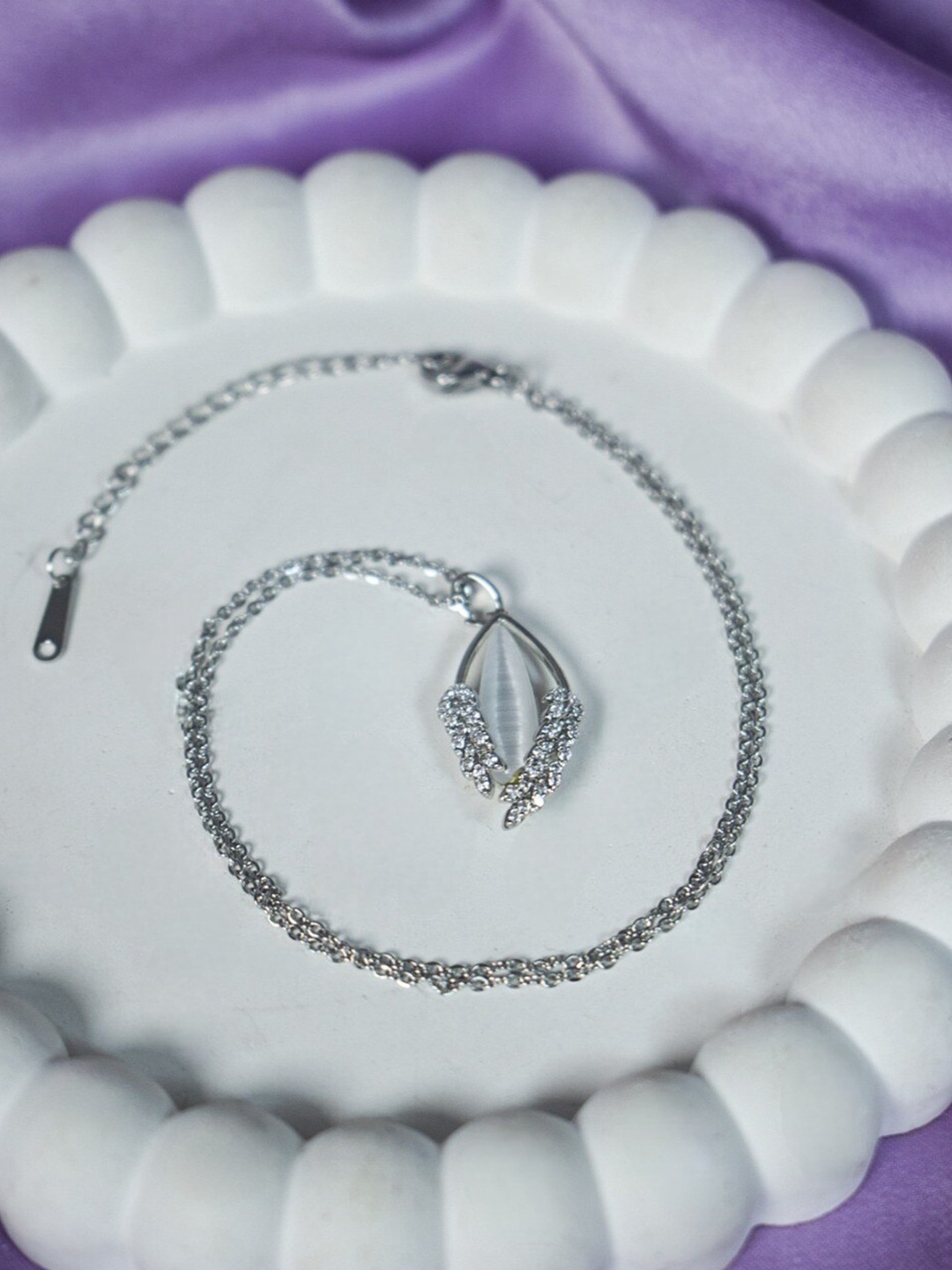 

DressBerry Silver Toned Crystal Studded Embrace Silver Pendant Necklace