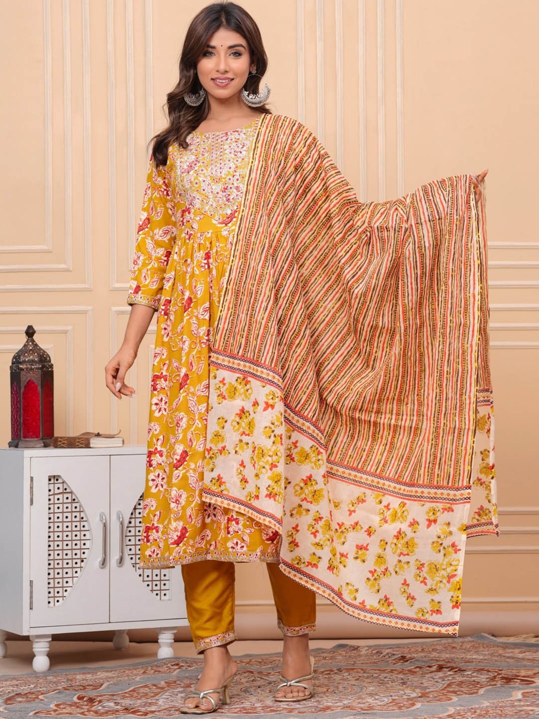 

UNISETS Floral Printed Thread Work A-Line Kurta & Trousers With Dupatta, Mustard