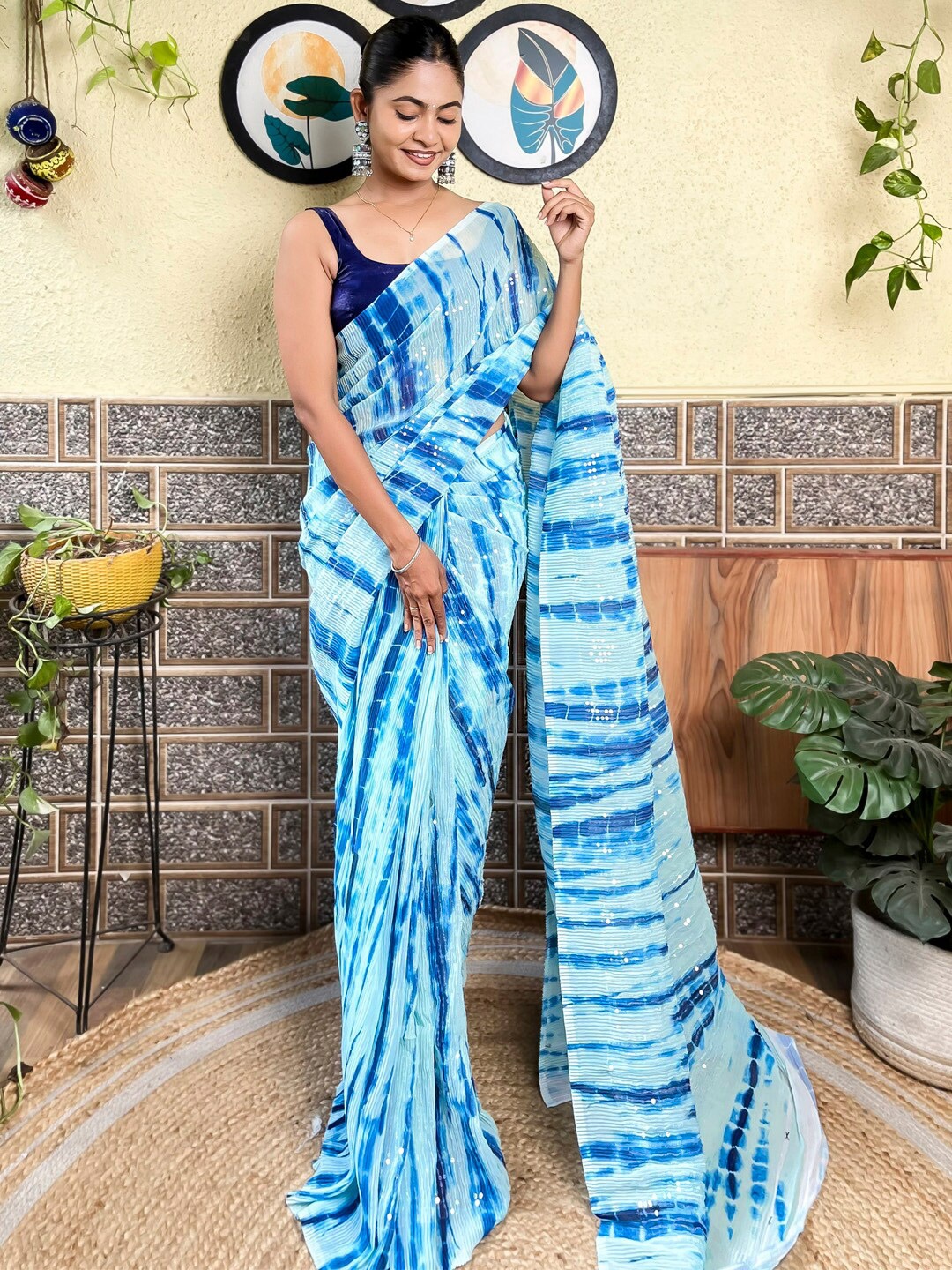 

Mitera Blue Tie and Dye Printed Poly Georgette Saree