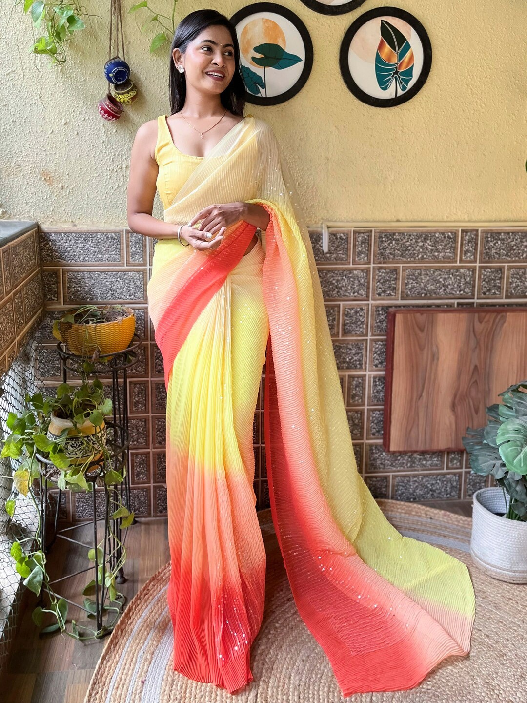 

Mitera Yellow & Red Ombre Embellished Pure Georgette Designer Saree