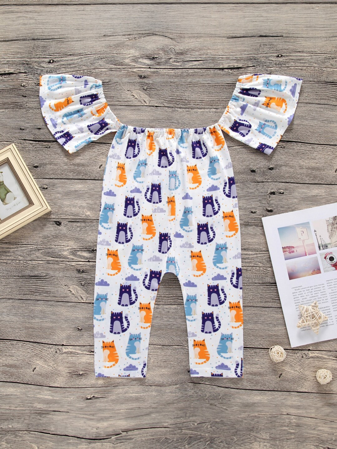 

StyleCast Girls White & Navy Blue Off-Shoulder Conversational Printed Basic Jumpsuit