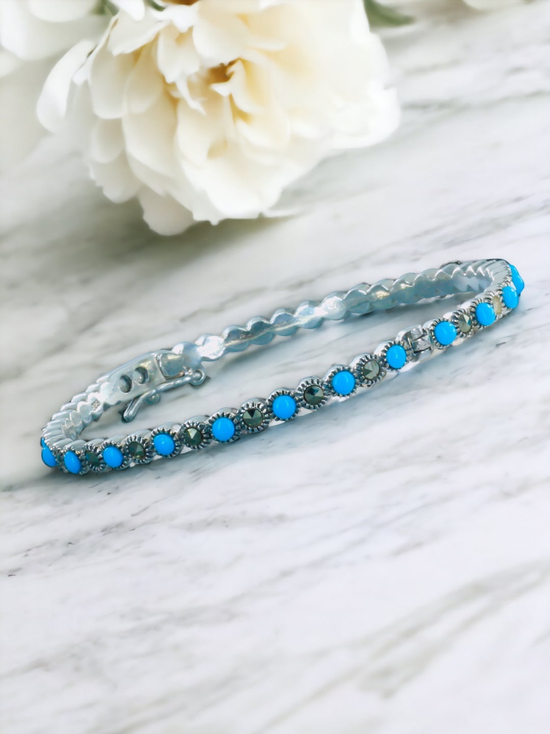 

Taraash 925 Sterling Silver Sky Blue Marquise Cubic Zirconia-Studded Bangle