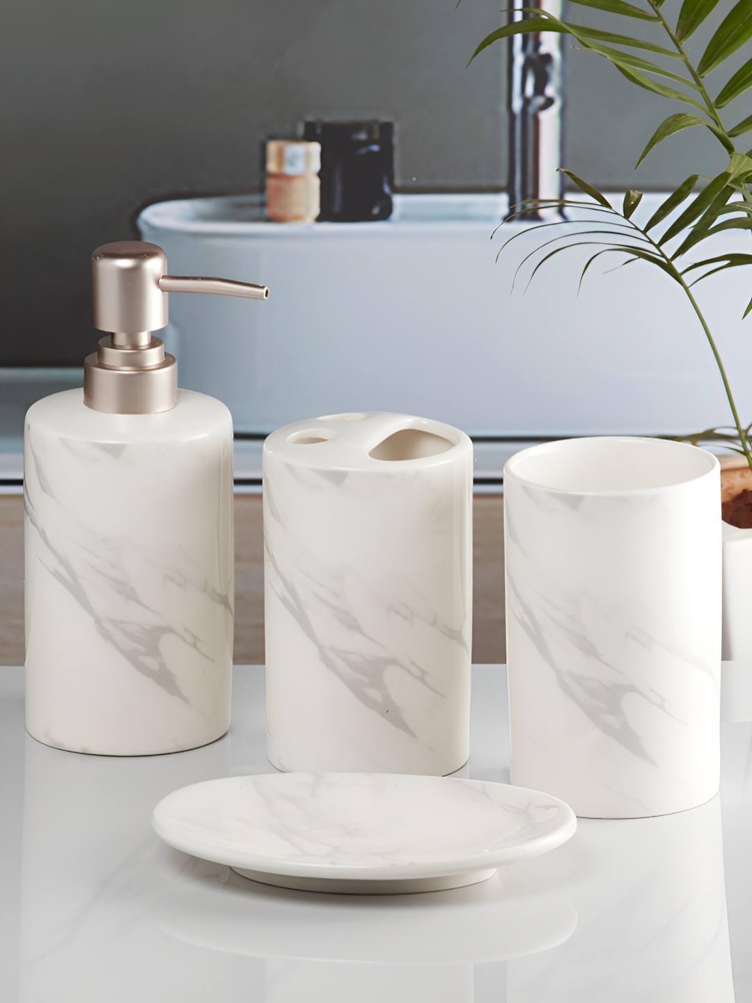 

Kookee White 4 piece Abstract Ceramic Bath Accessories Set