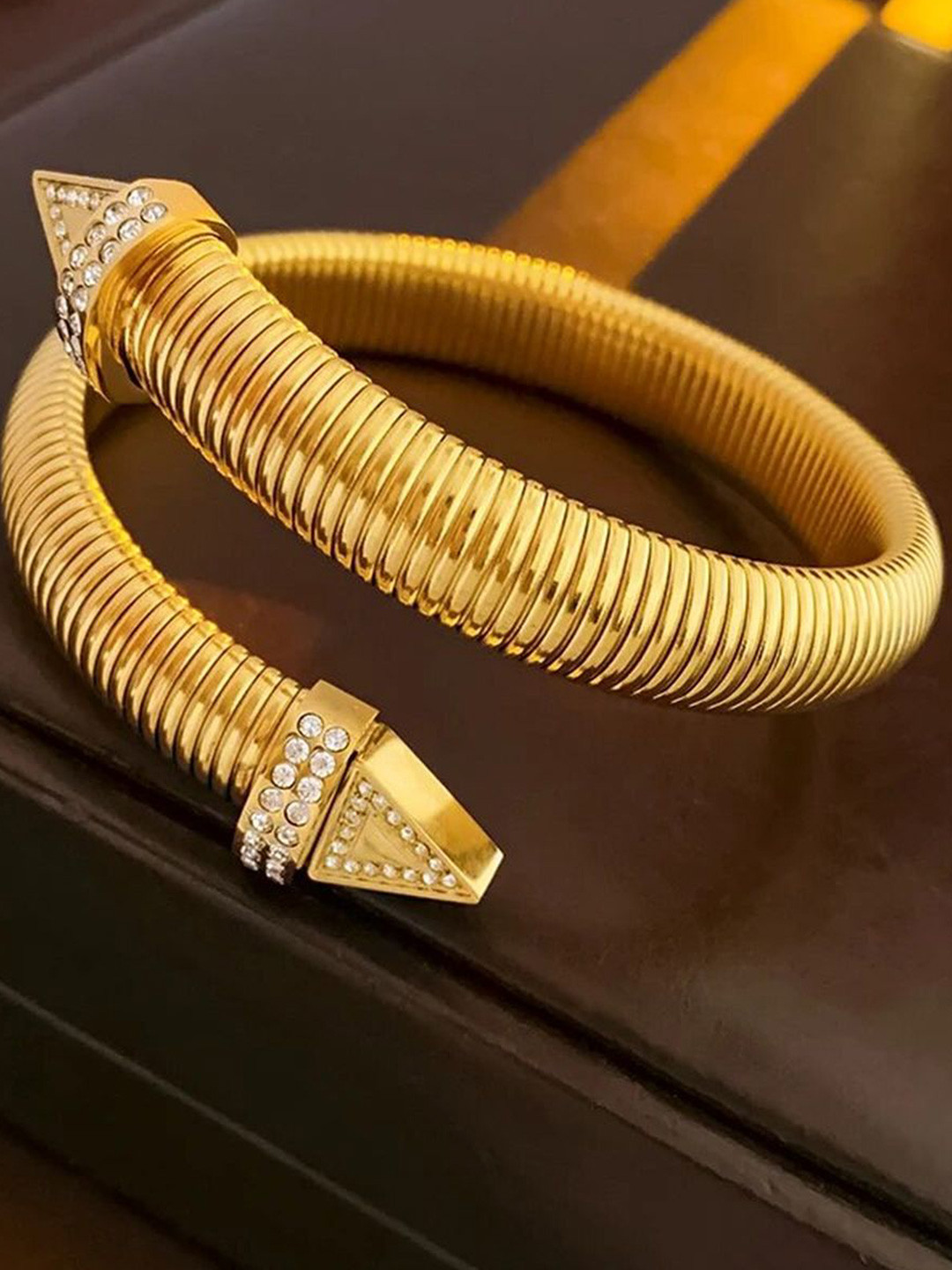

ZIVOM Women Gold-Toned & Gold-Toned Cubic Zirconia Gold-Plated Bangle-Style Bracelet