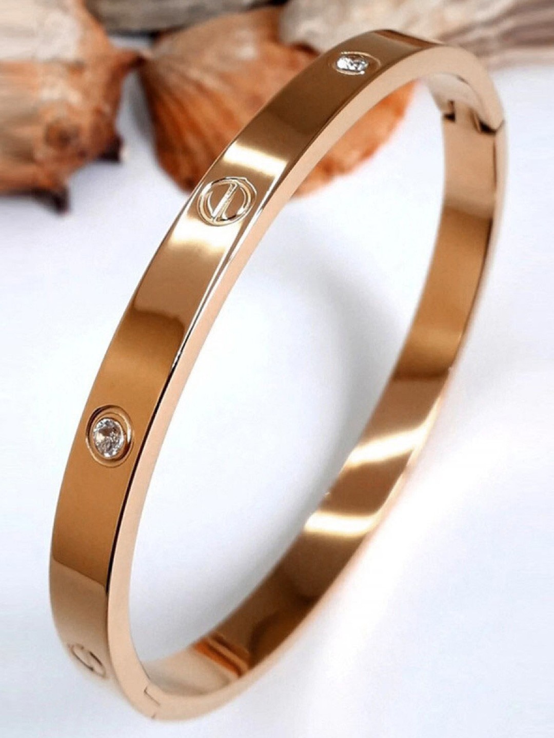 

ZIVOM Women Cubic Zirconia Rose Gold-Plated Kada Bracelet