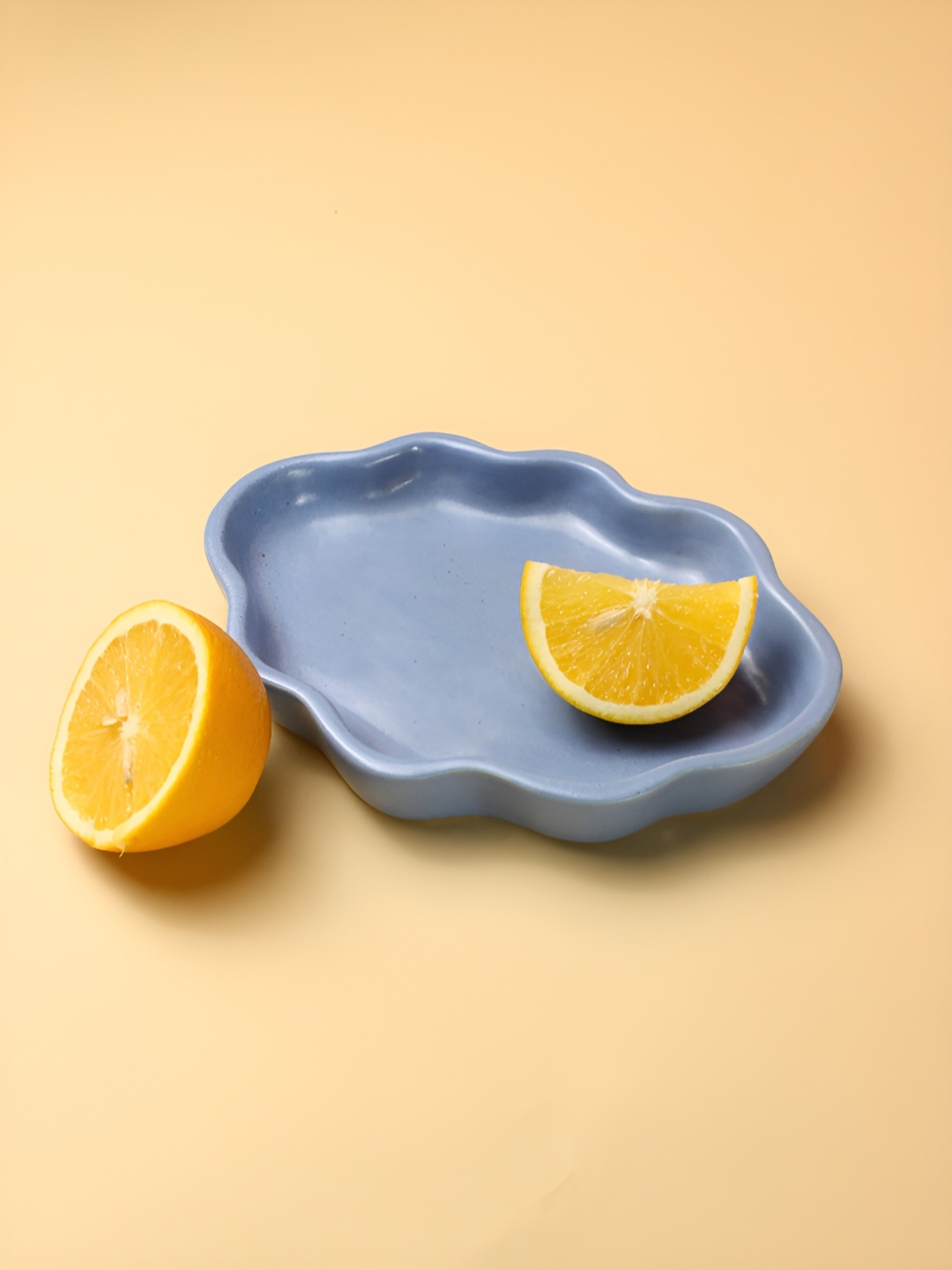 

The Orby House Blue Textured Ceramic Glossy Plate