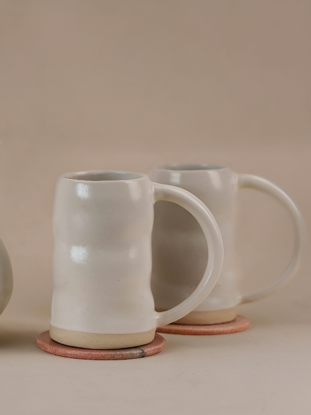 

The Orby House White 3 Pieces Ceramic Matte Finished Beer Pitcher & Beer Mugs