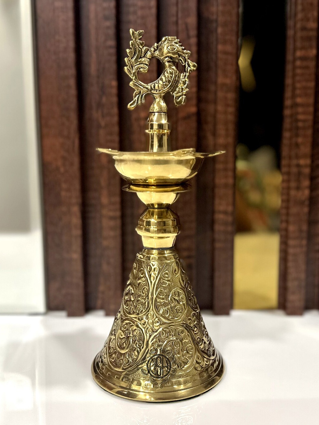 

DSH Crafting Your Curiosity Metallic toned Textured Kerela Cone Brass Diya