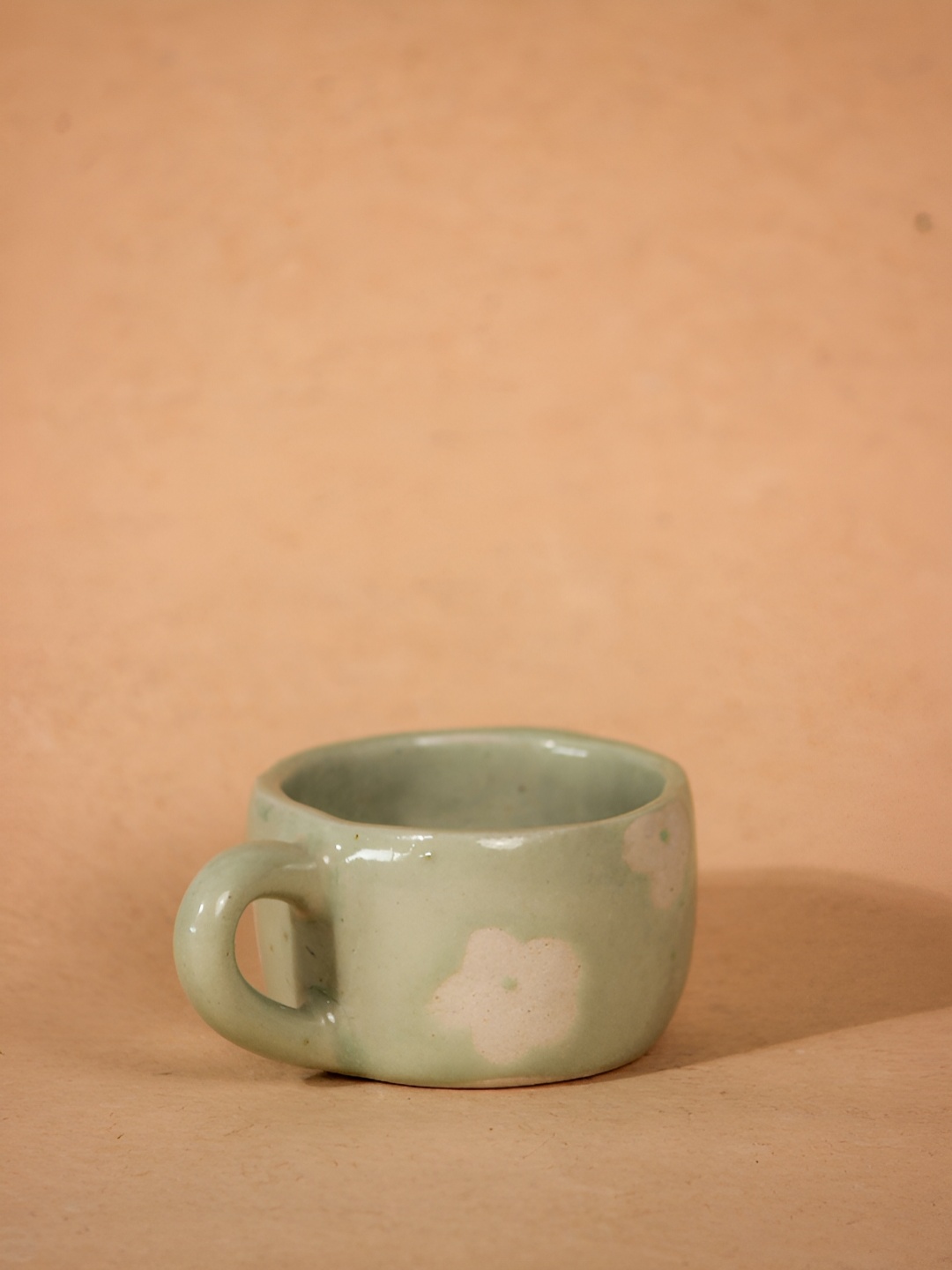 

The Orby House Green Handcrafted Printed Ceramic Glossy Finish Cup 150ml