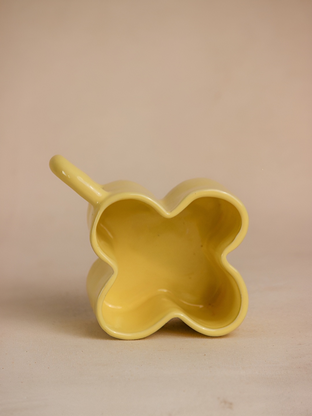 

The Orby House Yellow 4 Pieces Flower Textured Ceramic Glossy Cup