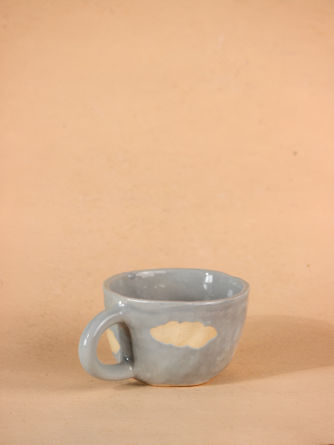 

The Orby House Grey & Beige Textured Ceramic Glossy Cup 100 ml