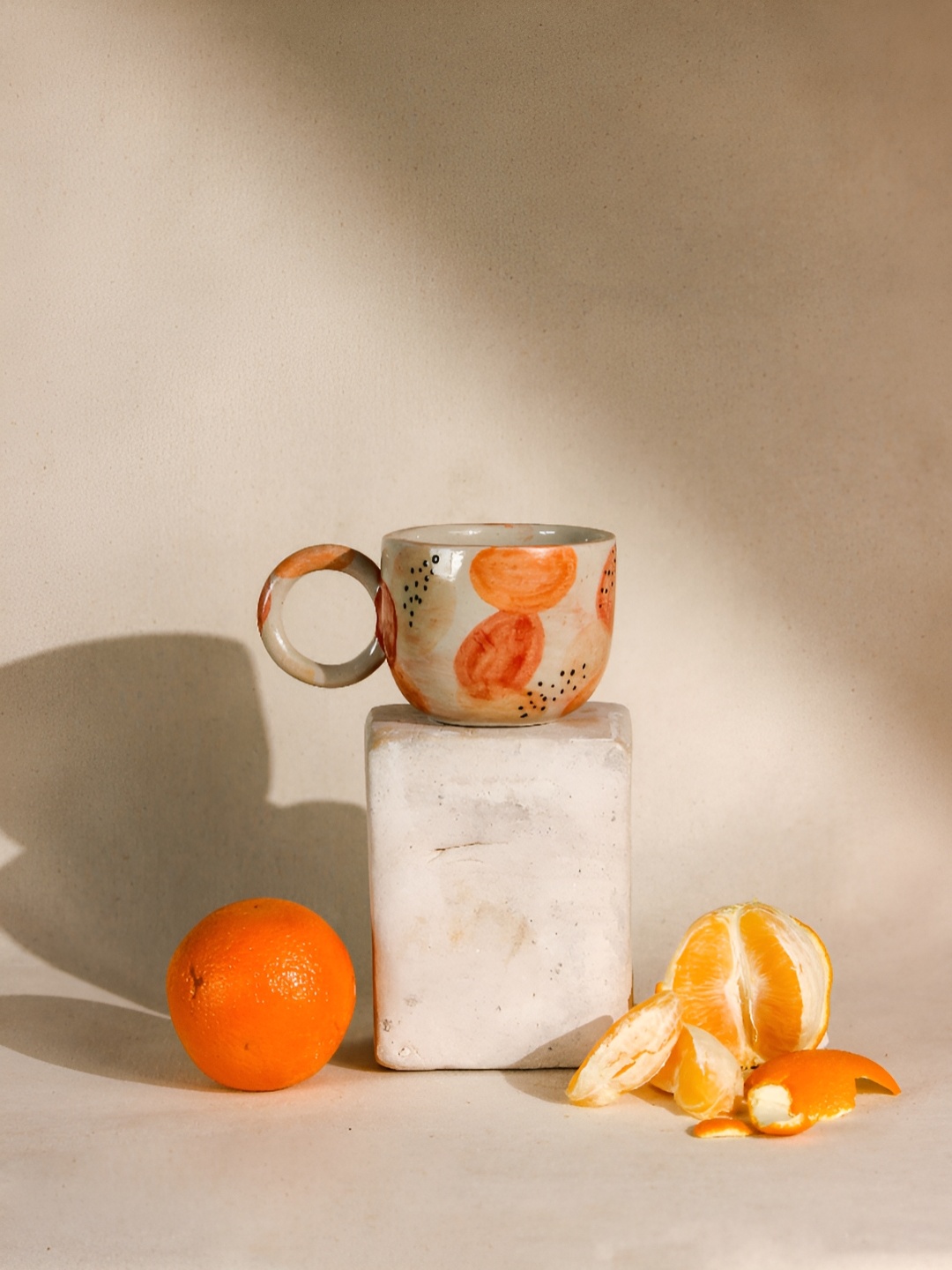 

The Orby House Orange & White Printed Dishwasher Safe Ceramic Glossy Cup 200 Ml