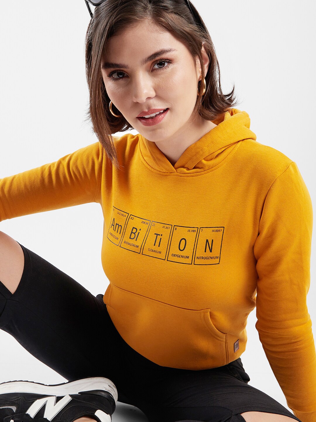 

Campus Sutra Typography Printed Cotton Hooded Sweatshirt, Mustard