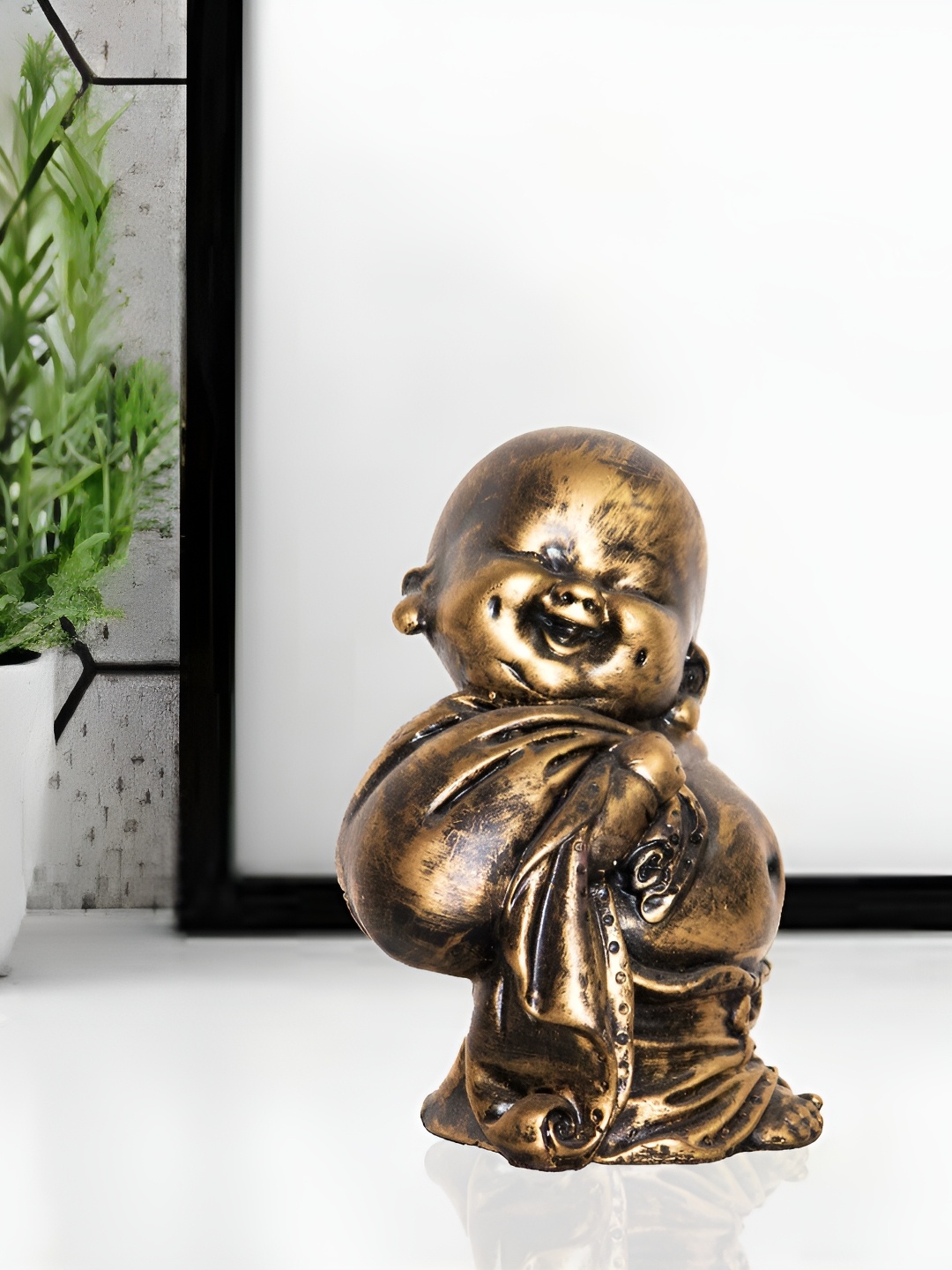 

BECKON VENTURE Gold Toned Feng Shui Meditating Buddha Figurine Showpiece