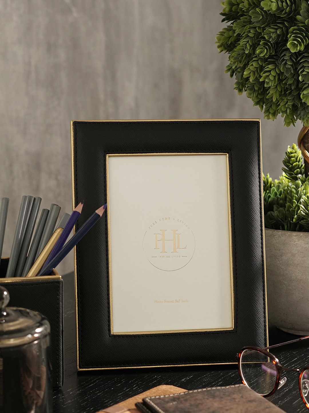 

Pure Home and Living Black & Gold Toned Self Design Faux Leather Table Photo Frame