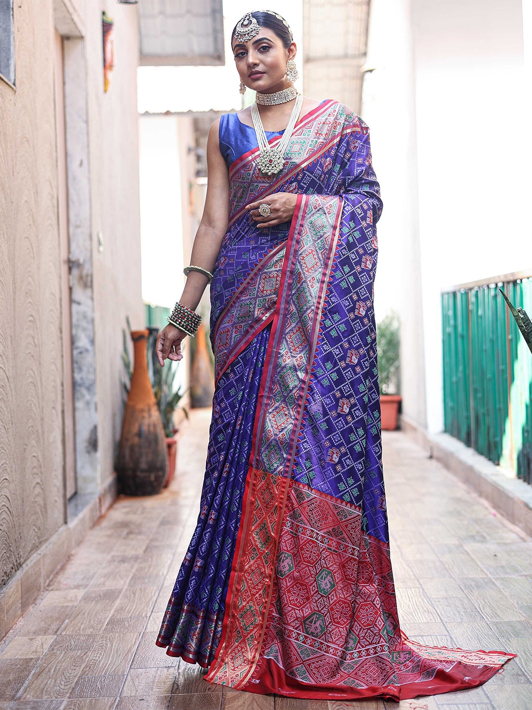 

Mitera Blue Ethnic Motifs Woven Design Zari Saree