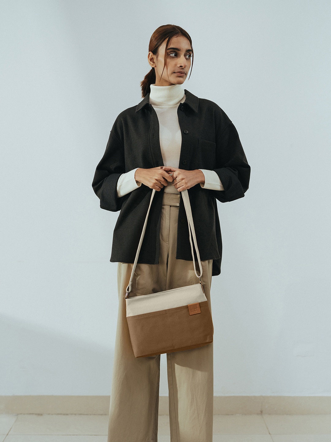 

DailyObjects Unisex Colorblocked Structured Sling Bag, Brown