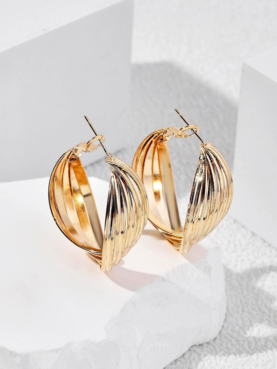 

OOMPH Twisted Oval Shaped Hoop Earrings, Gold