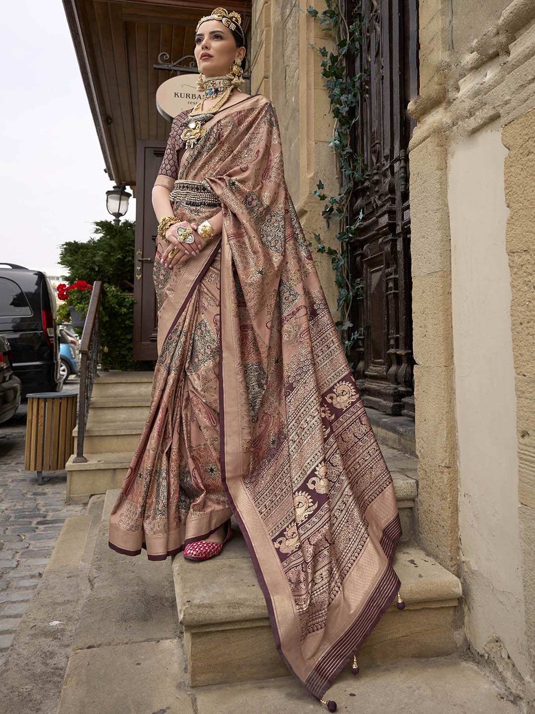 

Mitera Peach-Coloured Ethnic Motifs Printed Zari Saree