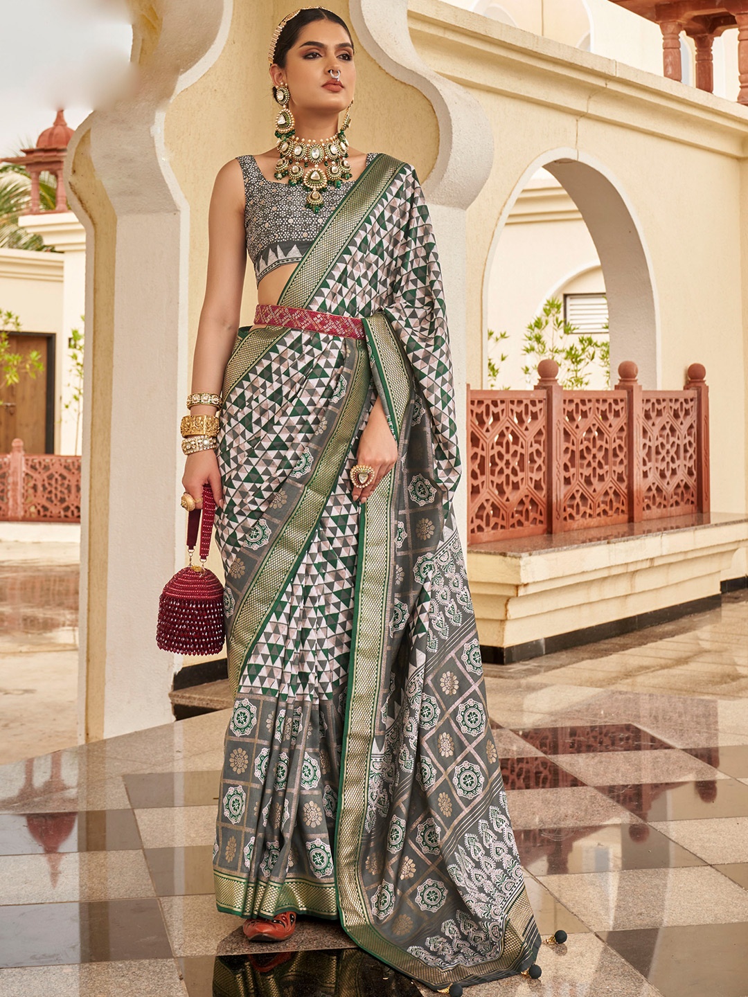

Mitera Green Ethnic Motifs Printed Zari Saree