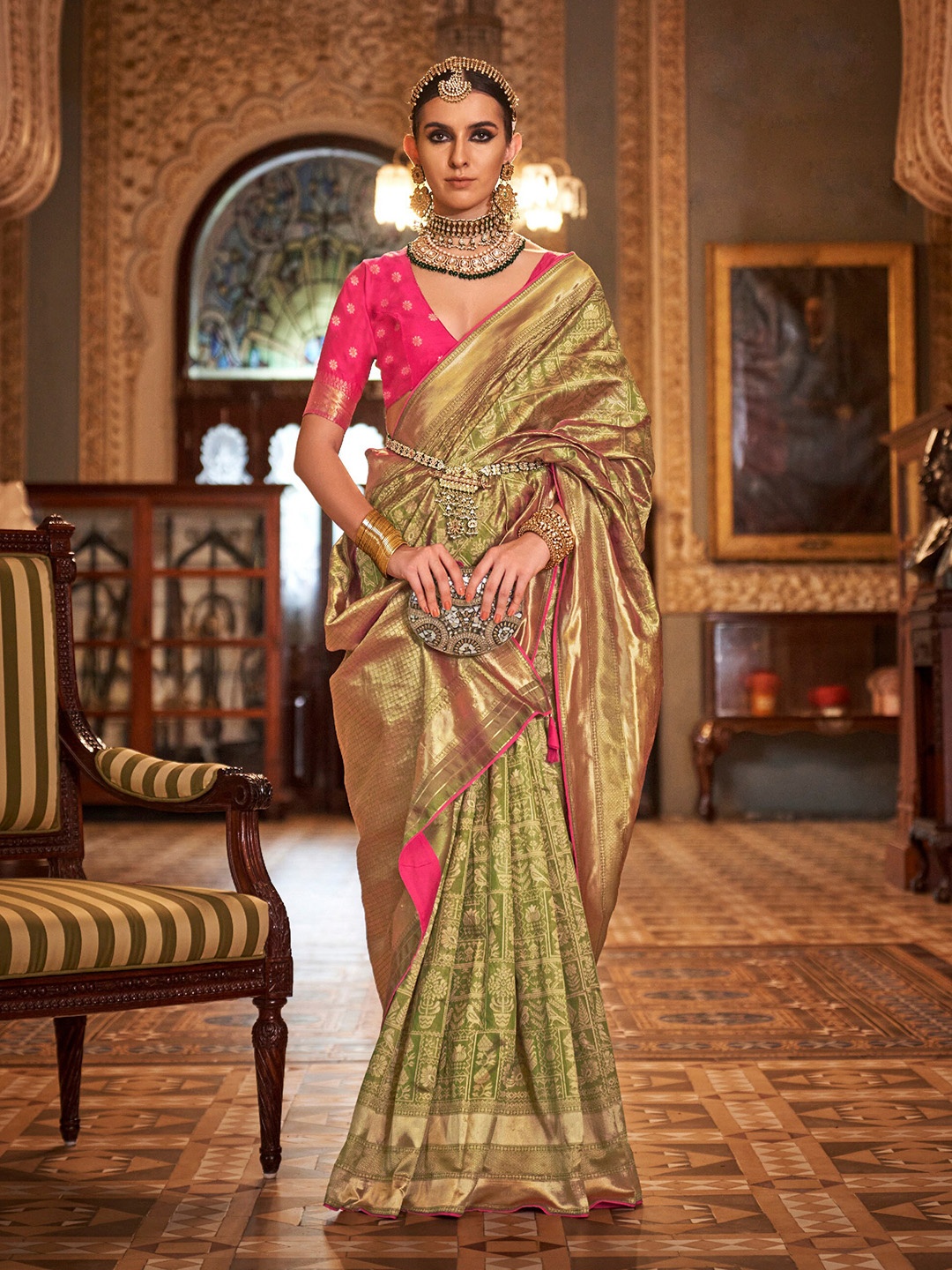 

Mitera Olive Green Ethnic Motifs Woven Design Zari Saree