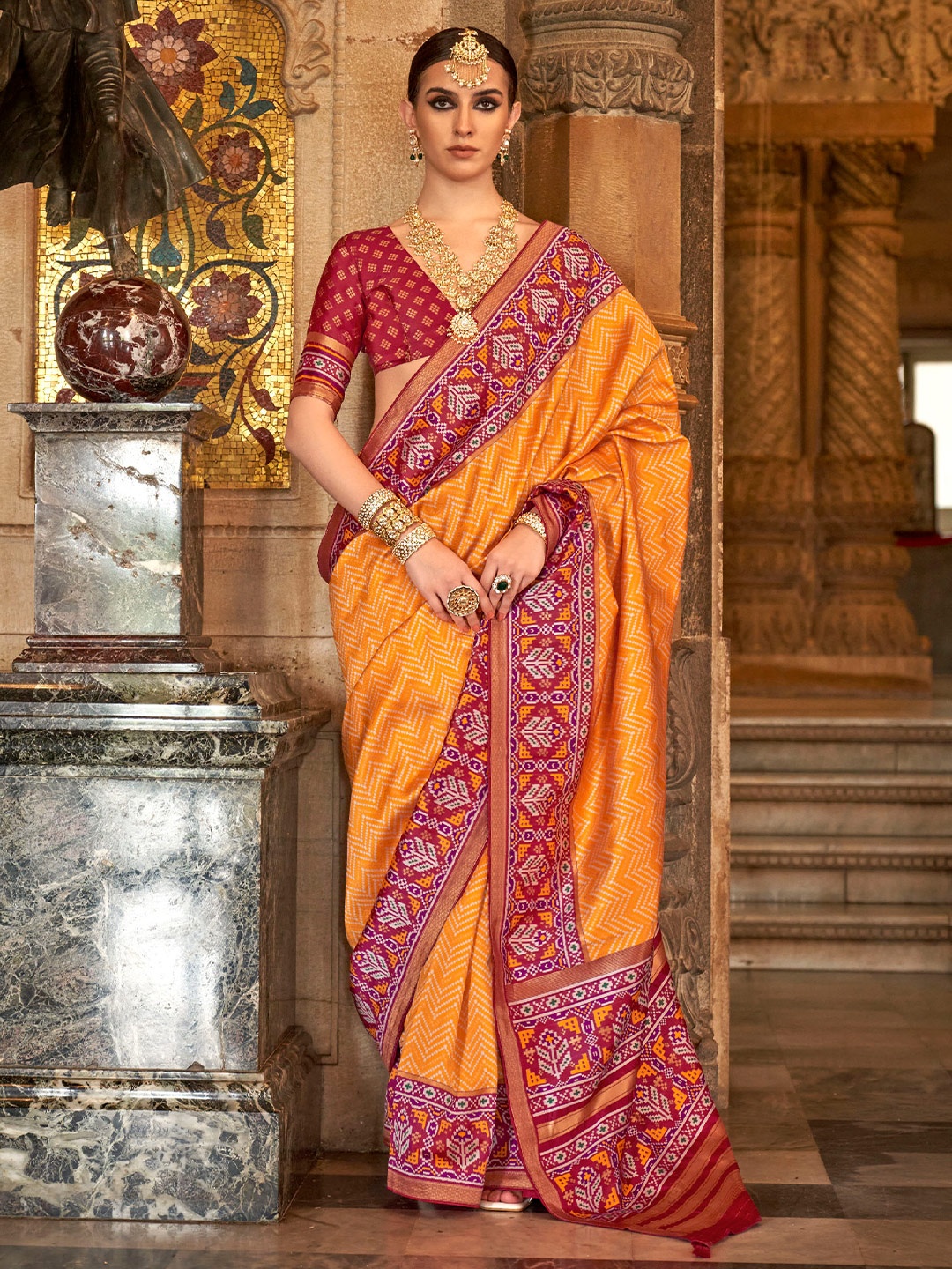 

Mitera Orange Geometric Printed Zari Saree
