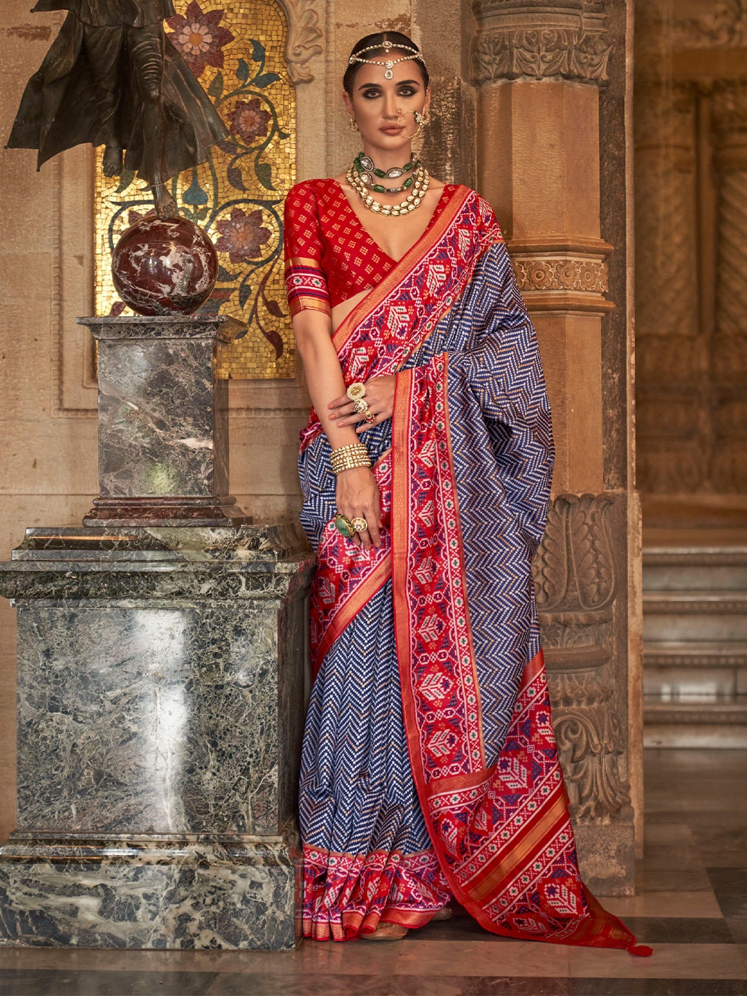 

Mitera Navy Blue Ethnic Motifs Printed Zari Saree