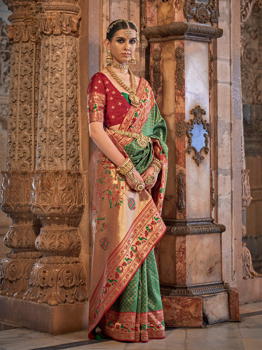 

Mitera Green Ethnic Motifs Woven Design Zari Saree