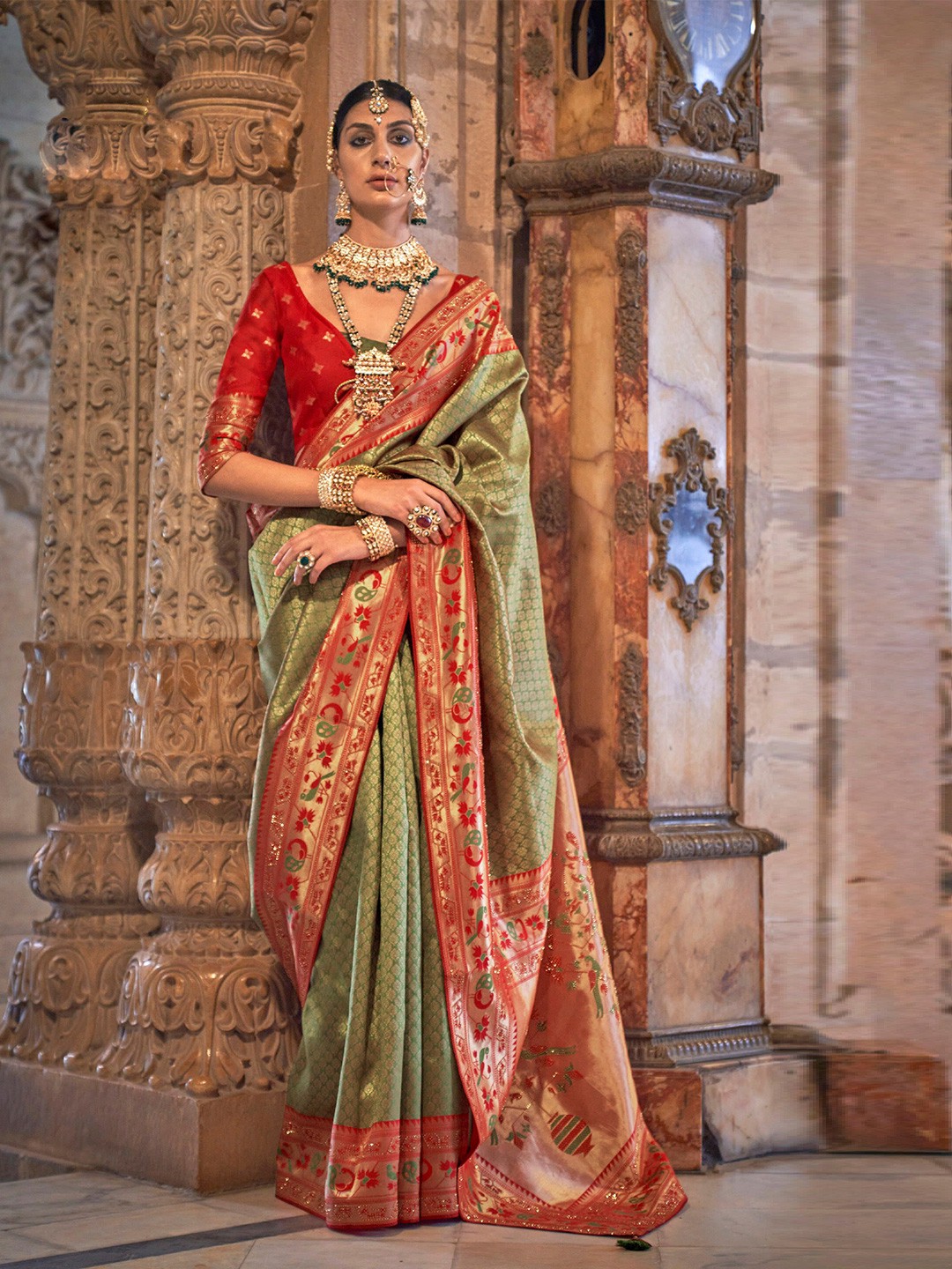 

Mitera Olive Green Ethnic Motifs Woven Design Zari Saree