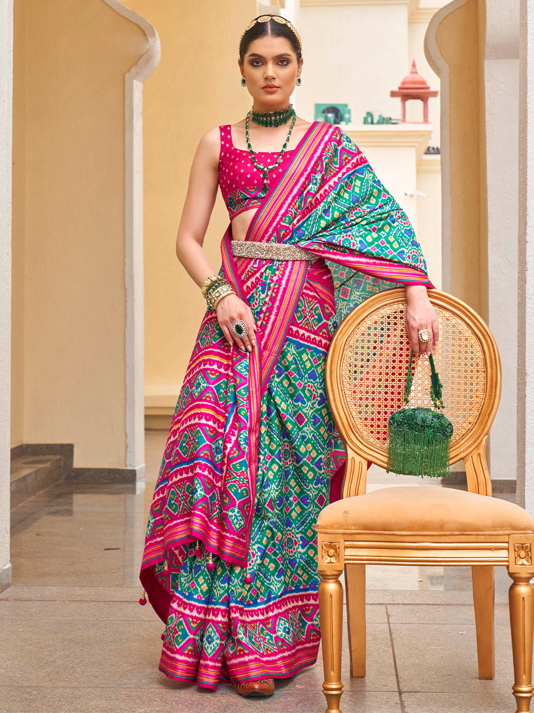 

Mitera Turquoise Blue Ethnic Motifs Printed Zari Silk Blend Patola Saree, Green