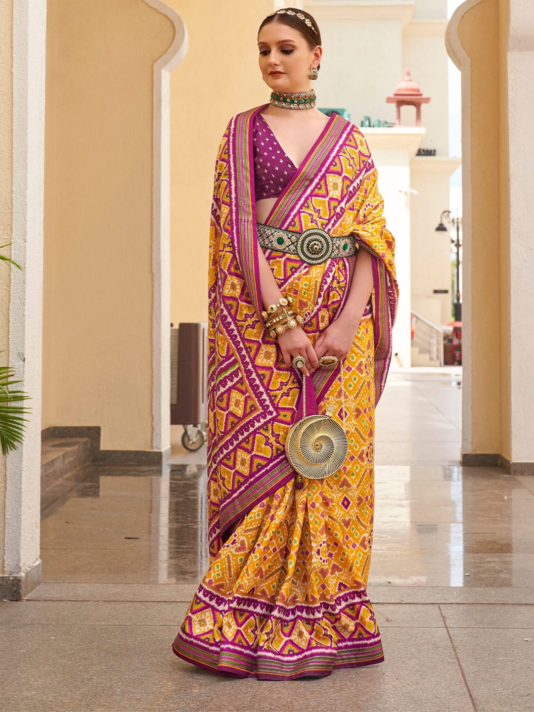

Mitera Mustard Ethnic Motif Printed Zari Patola Saree