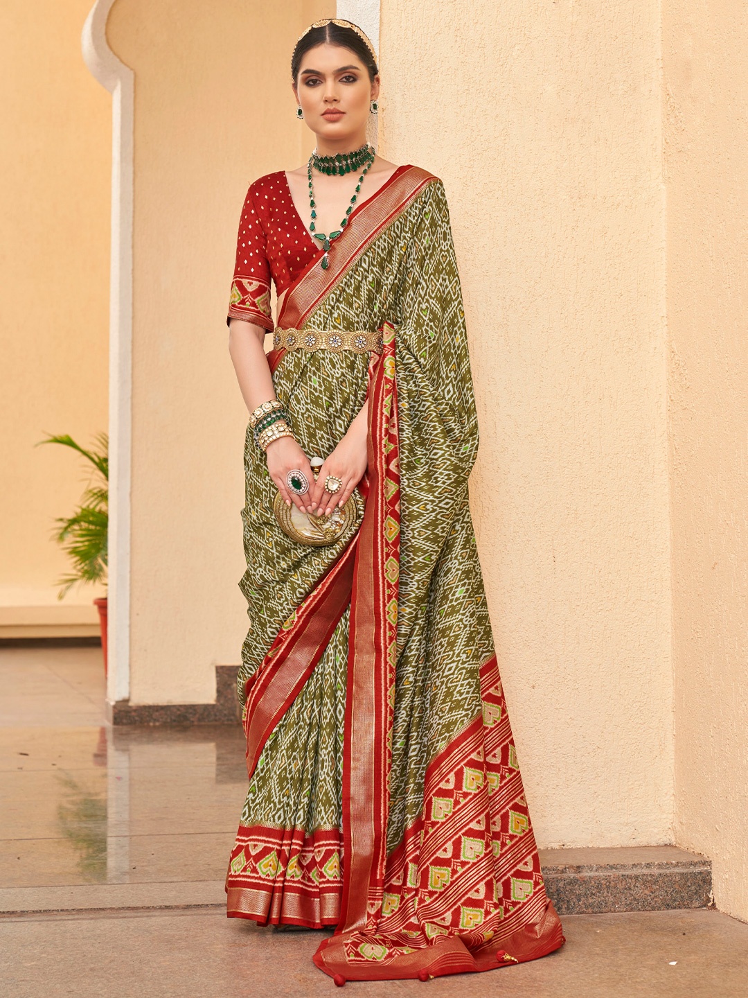 

Mitera Olive Green Ethnic Motif Printed Zari Patola Saree