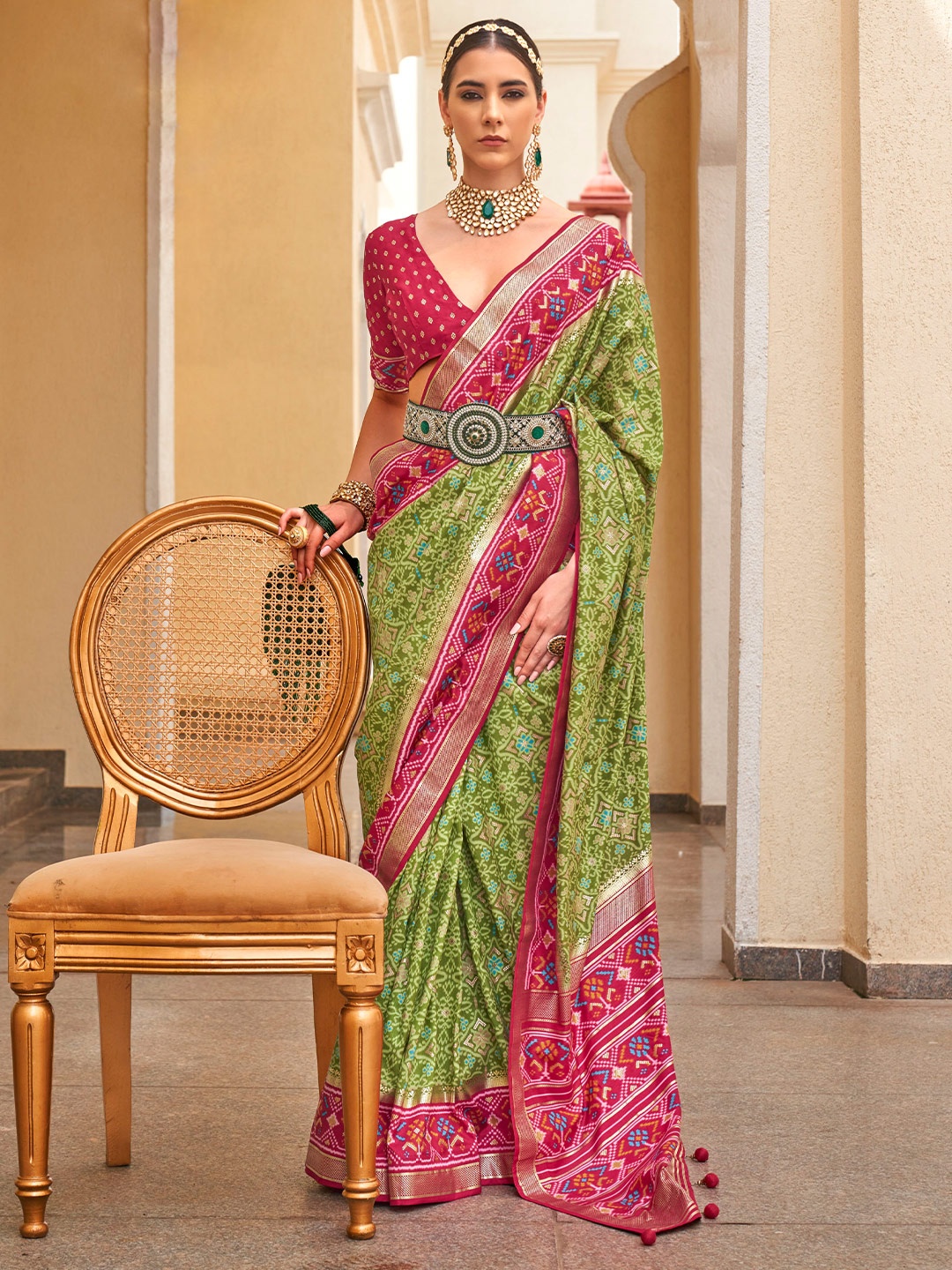 

Mitera Olive Green Ethnic Motif Printed Zari Patola Saree