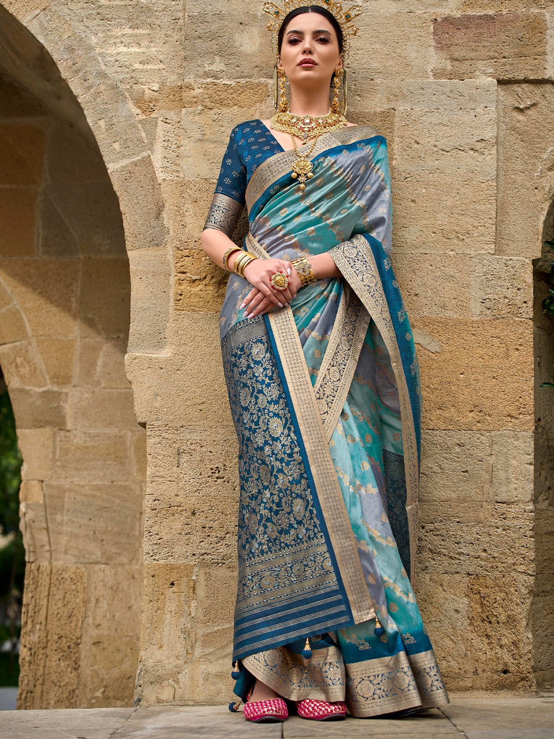 

Mitera Teal Floral Woven Designed Zari Saree