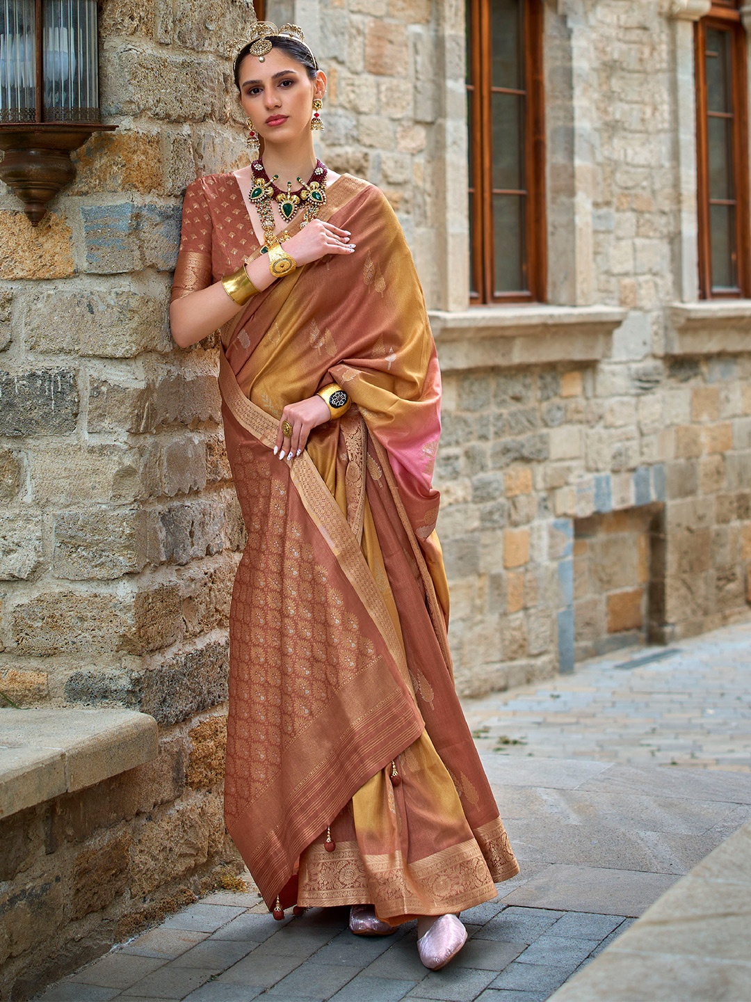 

Mitera Brown Ethnic Motifs Woven Design Zari Saree