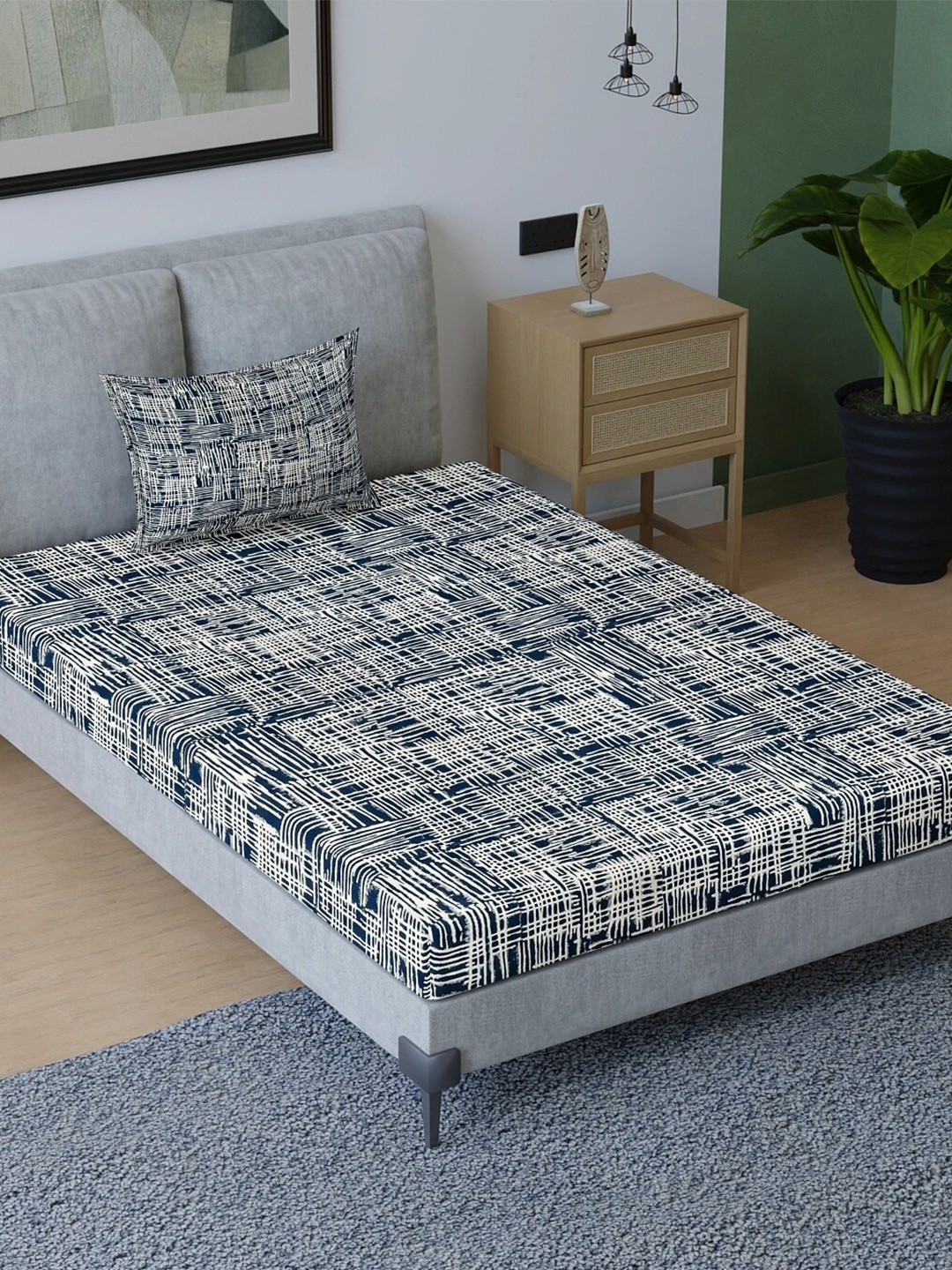 

Aura Blue & White Abstract Cotton 200 TC Single Bedsheet with Pillow Cover