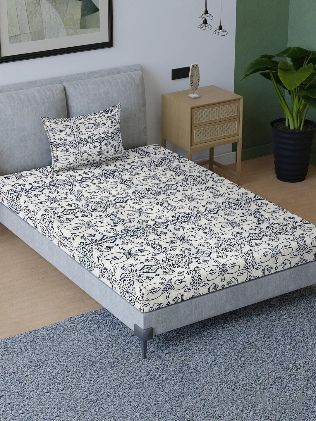 

Aura Blue & White Ethnic Motifs Cotton 200 TC Single Bedsheet with Pillow Cover