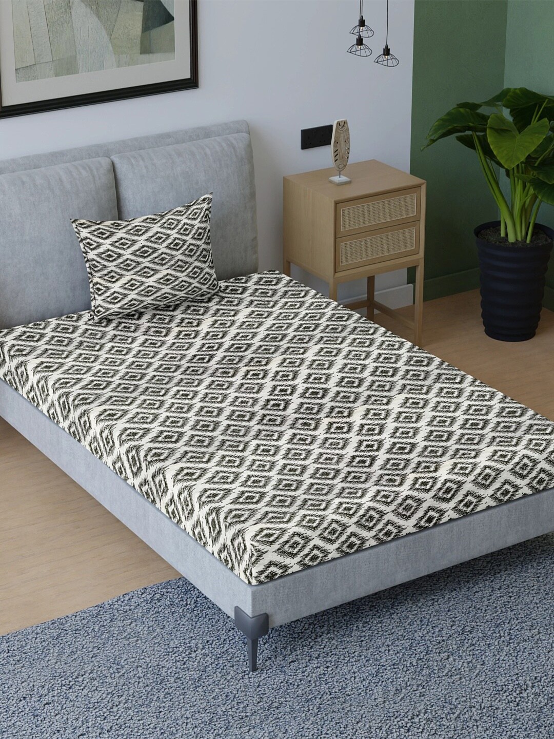 

Aura Black & White Geometric Cotton 200 TC Single Bedsheet with Pillow Cover
