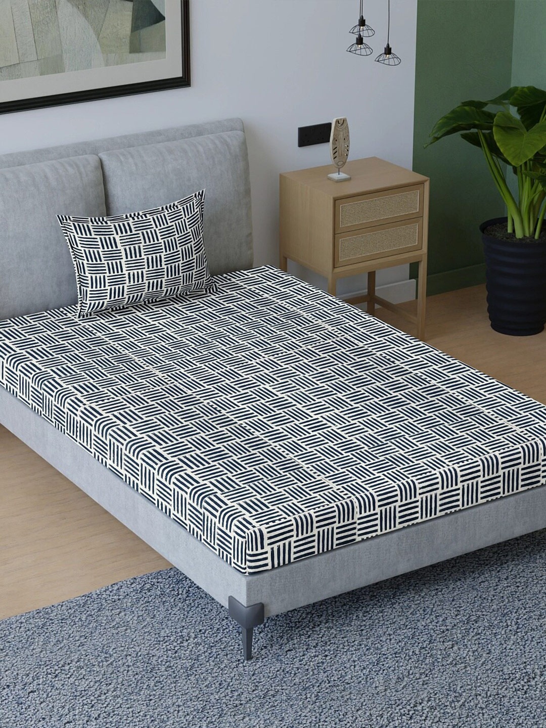 

Aura Blue & White Geometric Printed 200 TC Single Bedsheet with 1 Pillow Cover