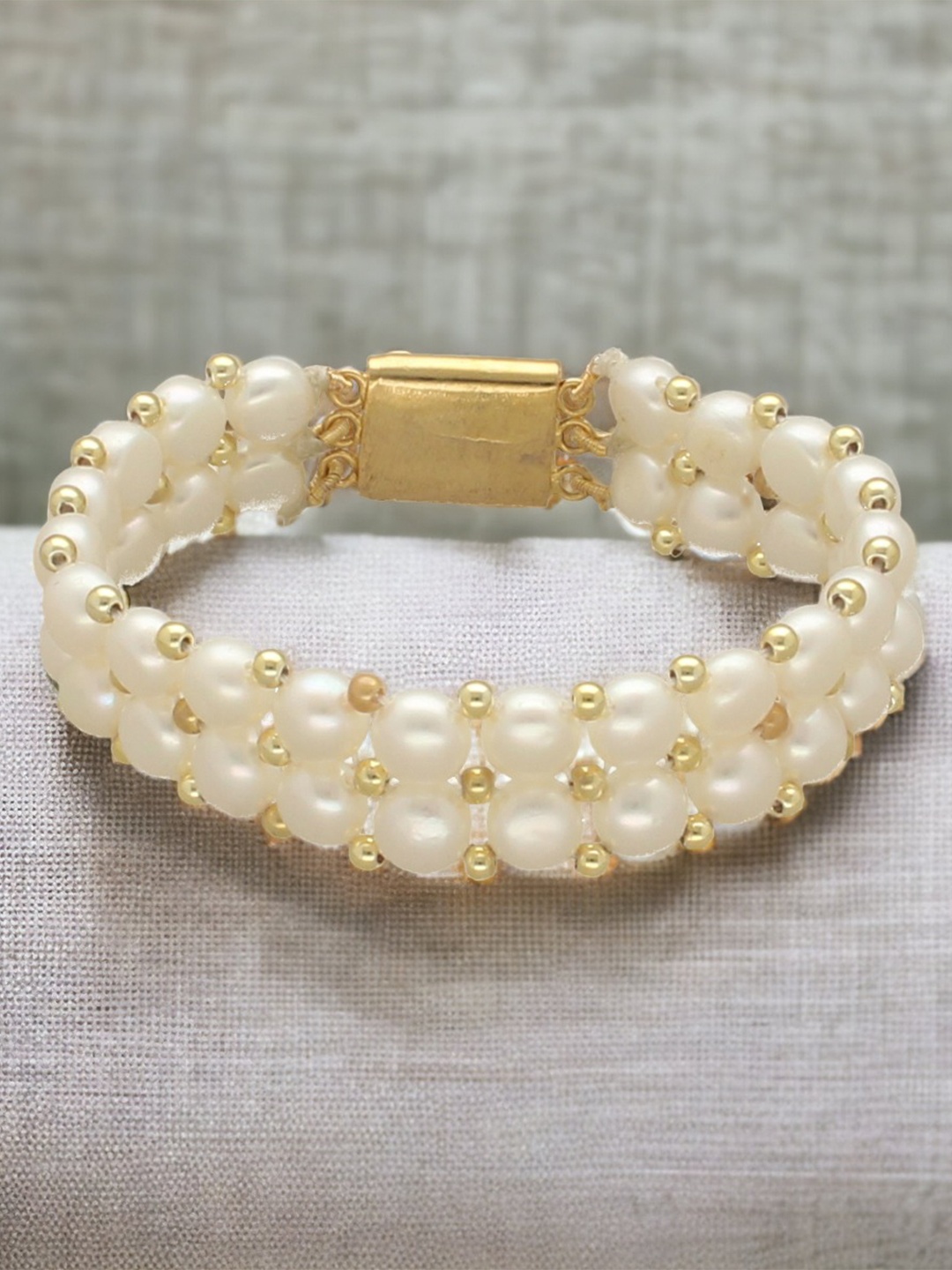 

Sri Jagdamba Pearls Dealer Women 2 Lines Pearls Gold-Plated Wraparound Bracelet, White