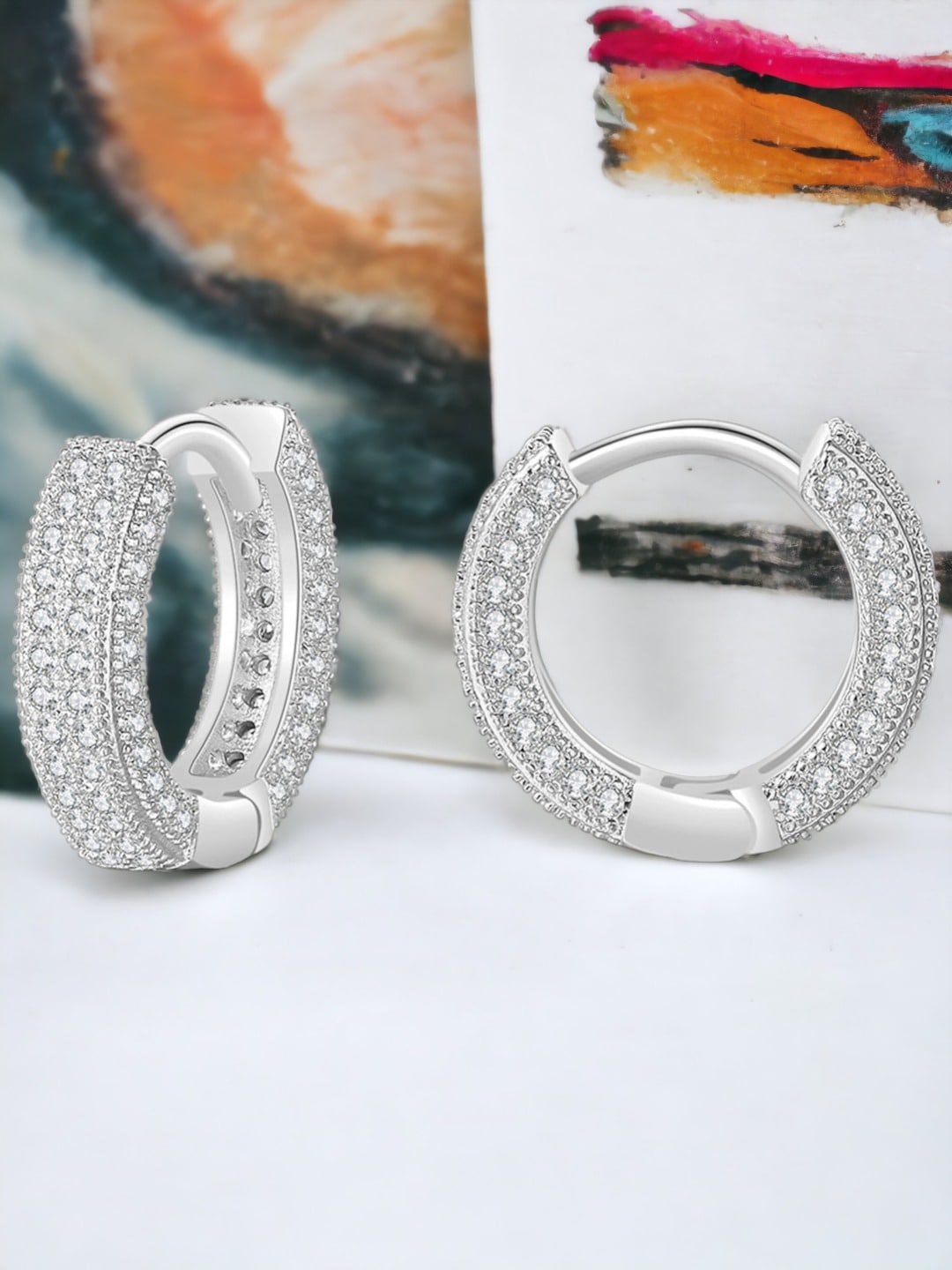 

Jewels Galaxy Silver-Plated American Diamond Studded Circular Hoop Earrings