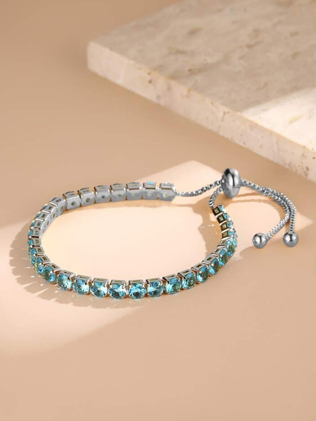 

Jewels Galaxy Silver Plated Round Cut Cubic Zirconia Matrix Tennis Bracelet, Turquoise blue