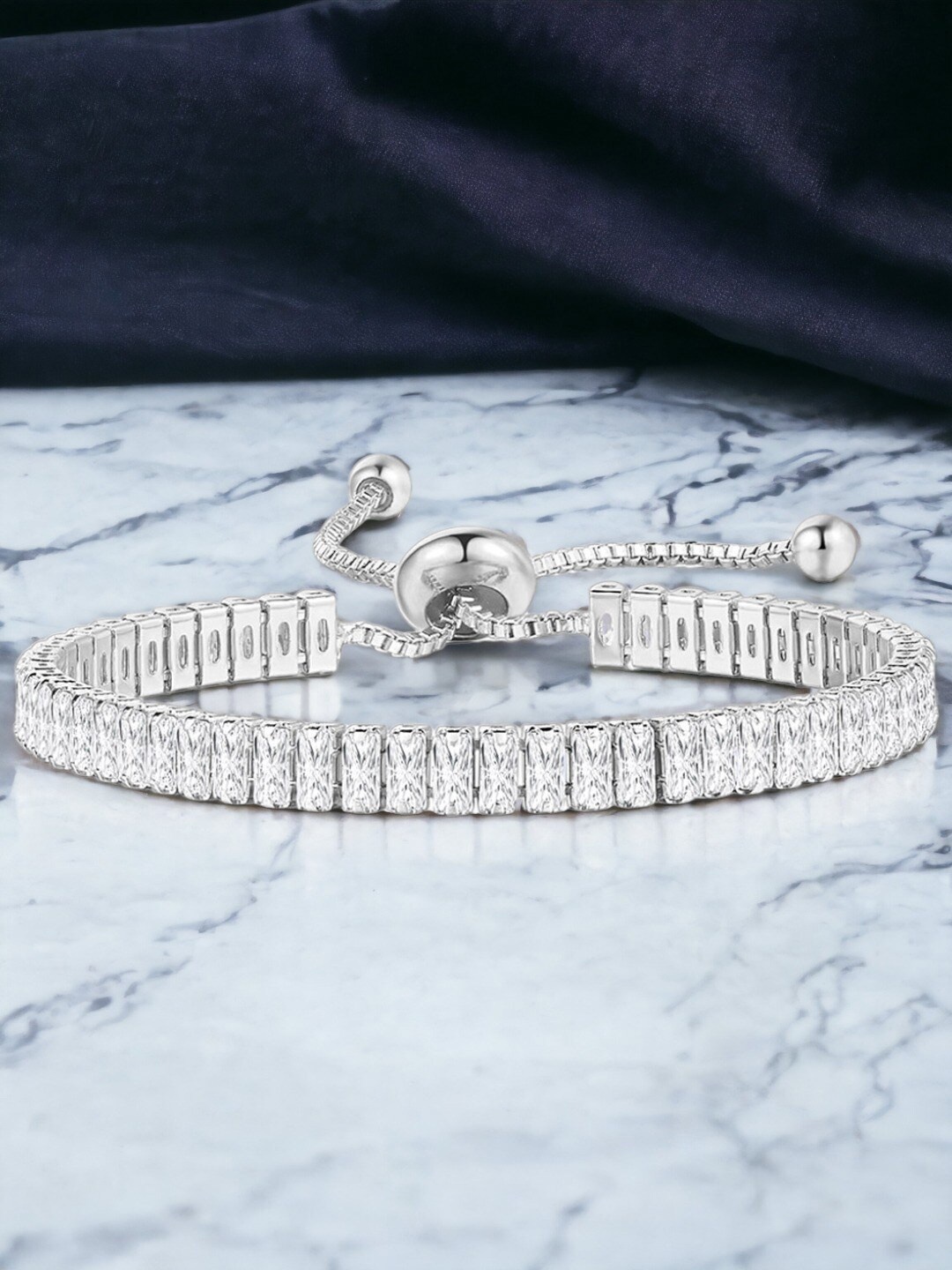 

Jewels Galaxy Silver Plated Rectangular Cut Cubic Zirconia Matrix Tennis Bracelet