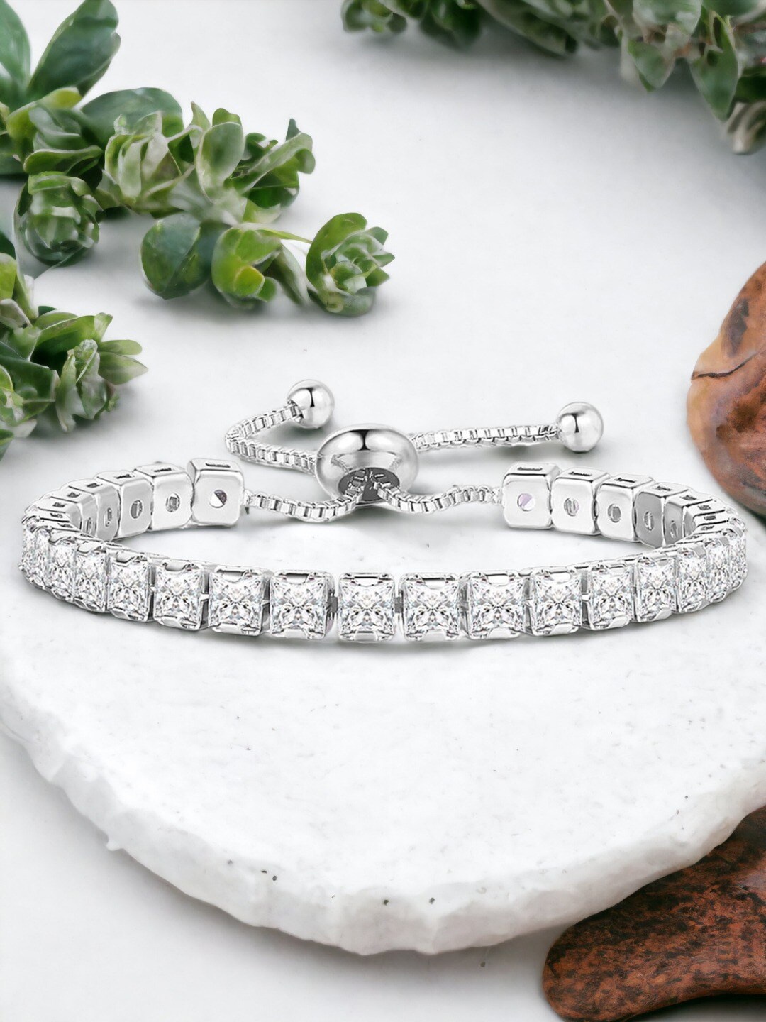 

Jewels Galaxy Silver Plated Square Cut Cubic Zirconia Matrix Tennis Bracelet