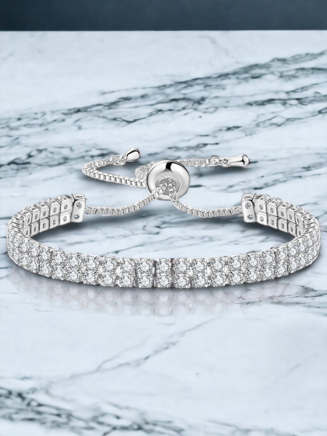

Jewels Galaxy Silver Plated Dual Strand Round Cut Cubic Zirconia Matrix Tennis Bracelet