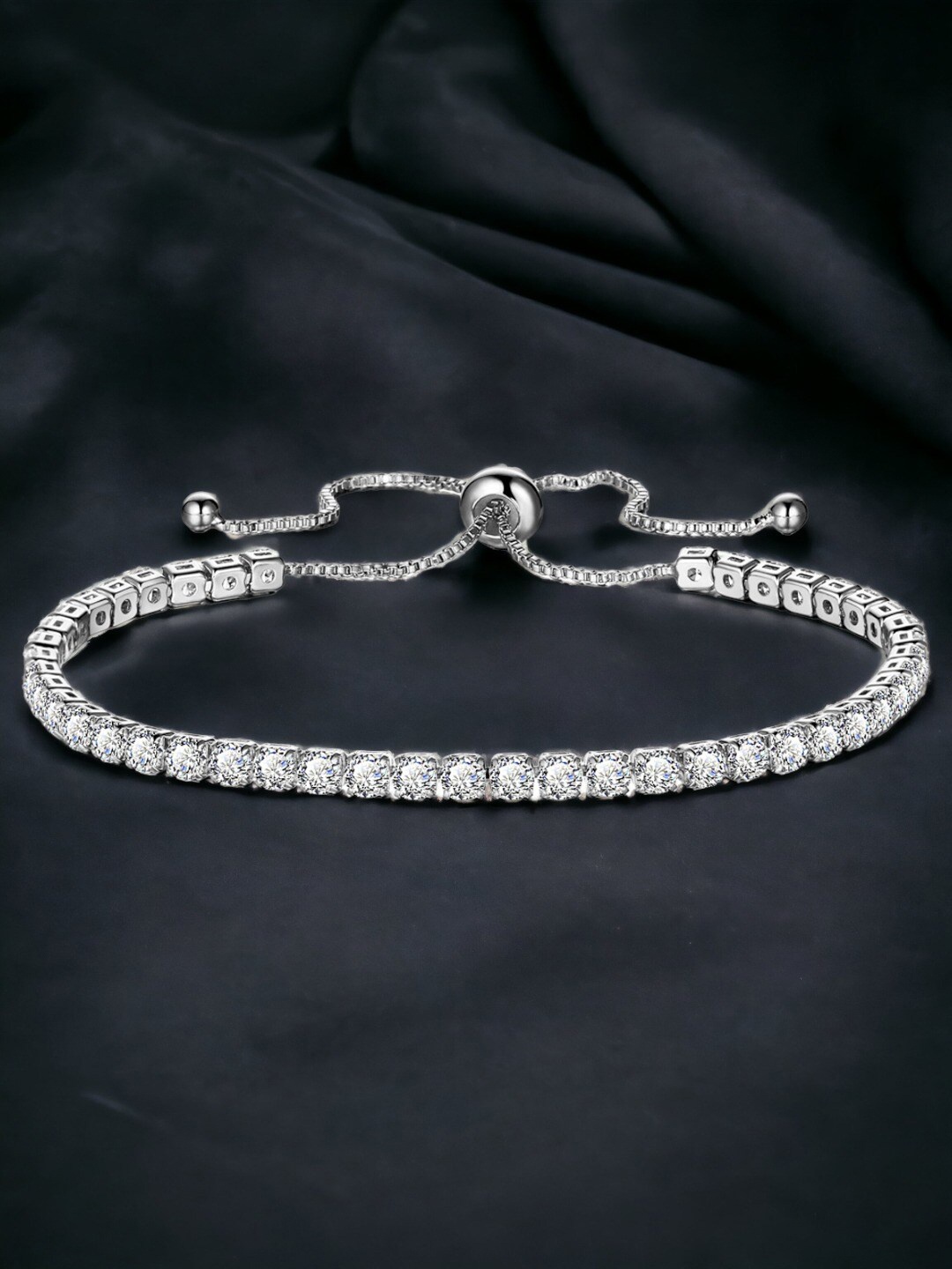 

Jewels Galaxy Silver Plated Round Cut Cubic Zirconia Matrix Tennis Bracelet