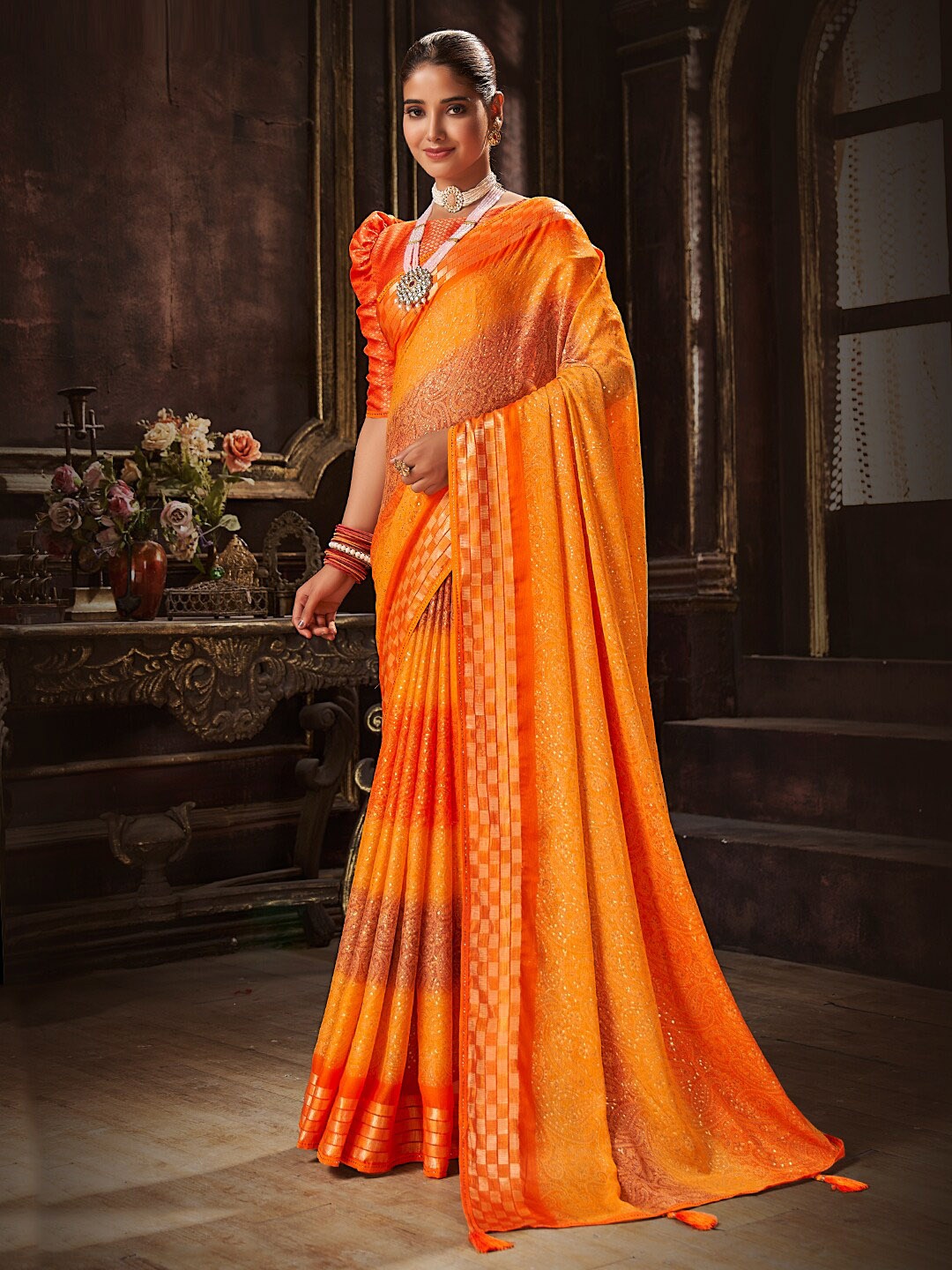 

SANSKAR Orange Paisley Foil Printed Pure Chiffon Saree