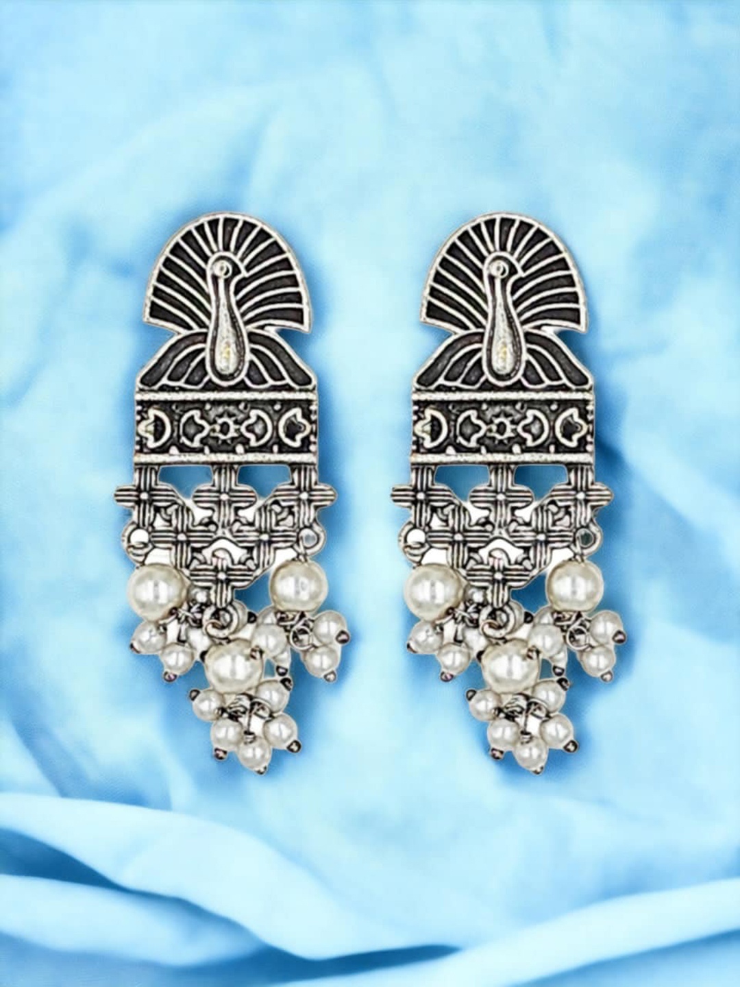 

Sangria Silver-Plated Kundan Studded Oxidised Earrings